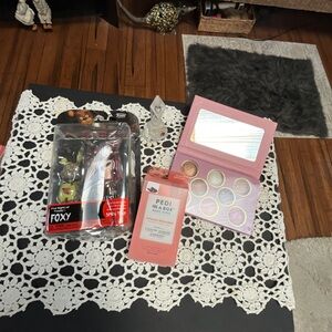 Pedi in a Box Deluxe; Bakred terracotta highlighter, bronzer &blush.Perfume bot